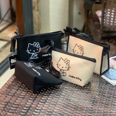 2023 Hallo Kitty legitimate authorized Korean version bow makeup bag makeup bag coin purse mobile phone bag